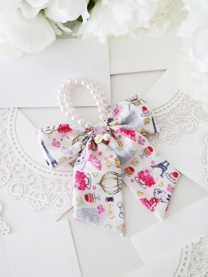 Claris - The Chicest Mouse In Paris™ Fashion Print and Pearl Hair Elastic with Bow
