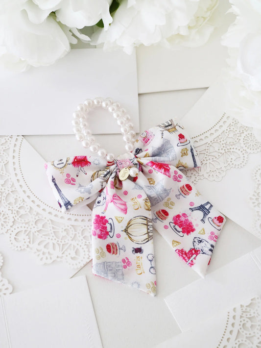 Claris - The Chicest Mouse In Paris™ Fashion Print and Pearl Hair Elastic with Bow